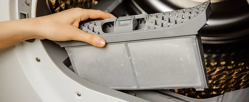 Signs Of A Clogged Dryer Lint Trap in Warrensburg, Missouri